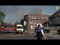 HUGE plumes of smoke as firefighters battle a blaze at supermarket in Golders Green
