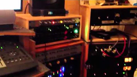 Joan playing guitar at studio