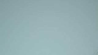 Giant Kid Shooting Spud Gun