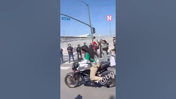 Motorbikes Smash Into Police Line in Los Angeles During ICE Protests
