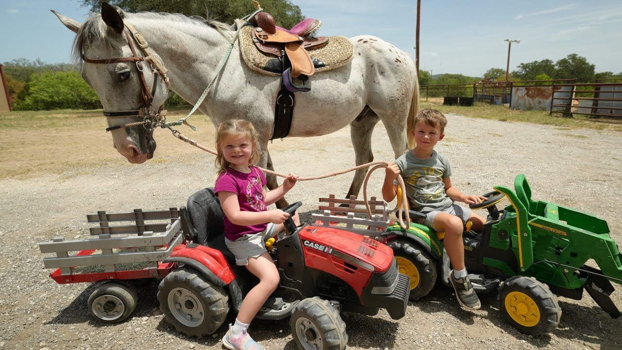 engage children in learning about farming by riding on a hay truck or tractor on the farm.