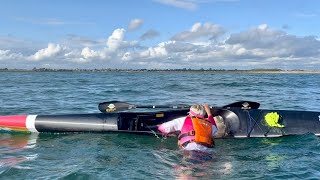 Surfski reentry in waves