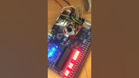 State Machine Design in VHDL and Programming a FPGA