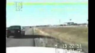A car pulling up and get smashed by a truck