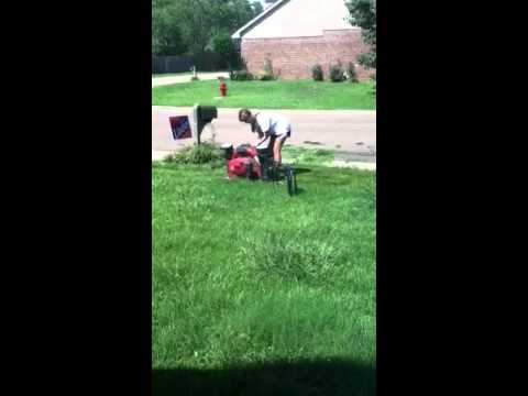 Jessica ATEMPTING to mow the grass