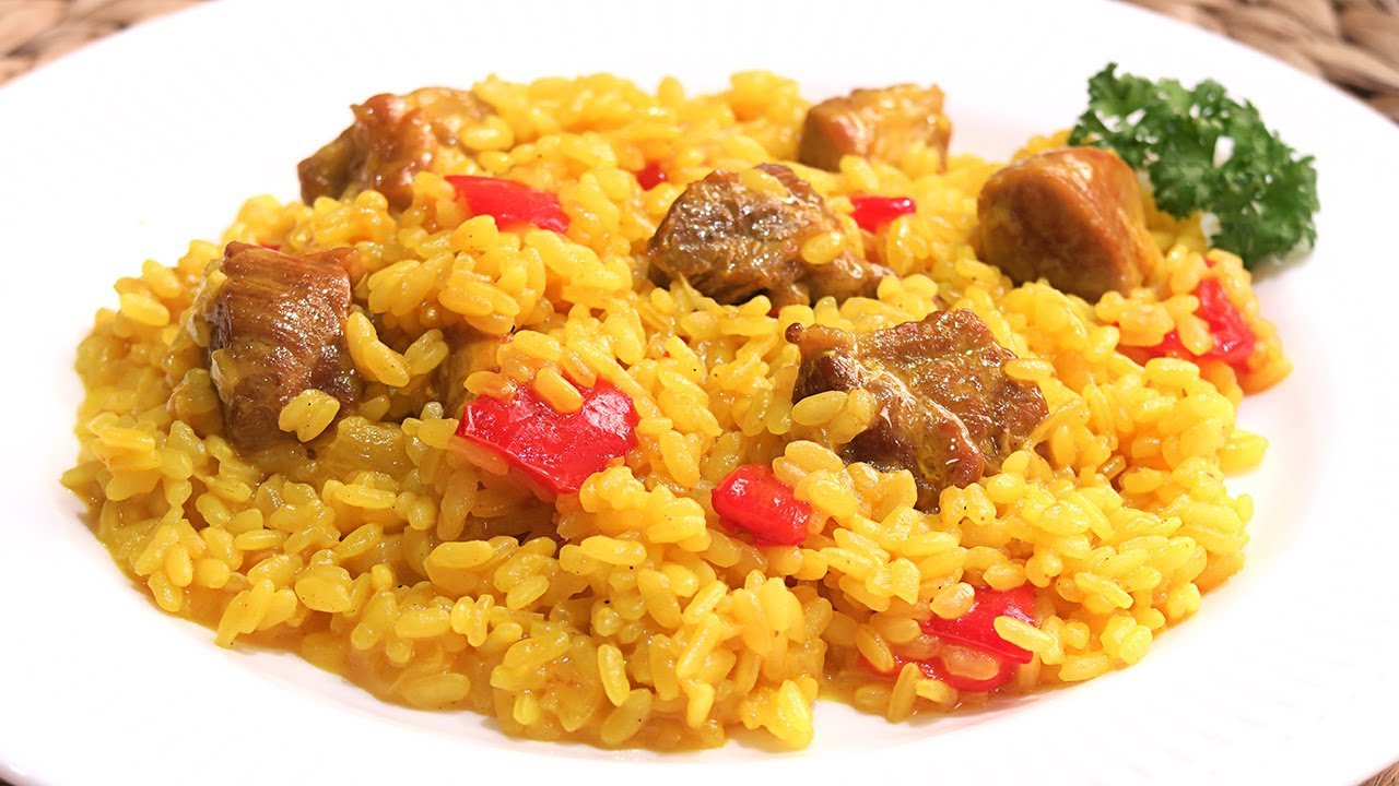 Resultado de imagen de arroz amarillo con carne