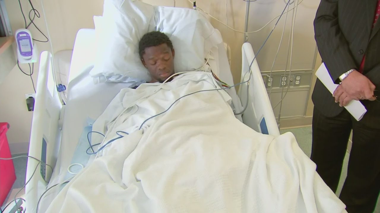 South Boston Murders Suspect Arraigned From Hospital Bed - YouTube