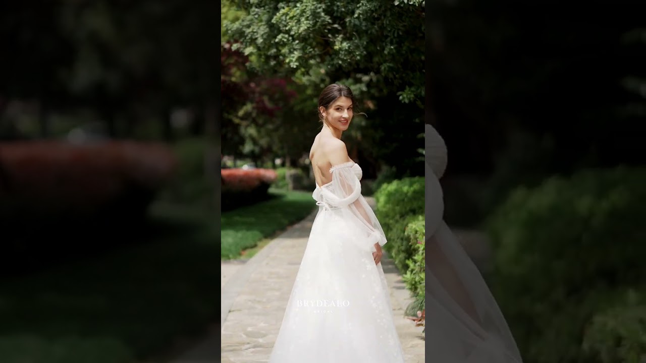 Romantic off shoulder shimmery wedding dress 