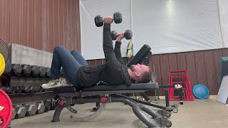 Hooklying Alternating Dumbbell Bench