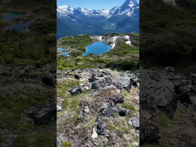 Hiking Trail with Crystal-Clear Waters and Stunning Mountain Views in BC