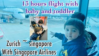 funny baby and  first time ride a plane