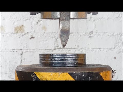 Can the tip of a hydraulic press break through jacks and iron pieces?