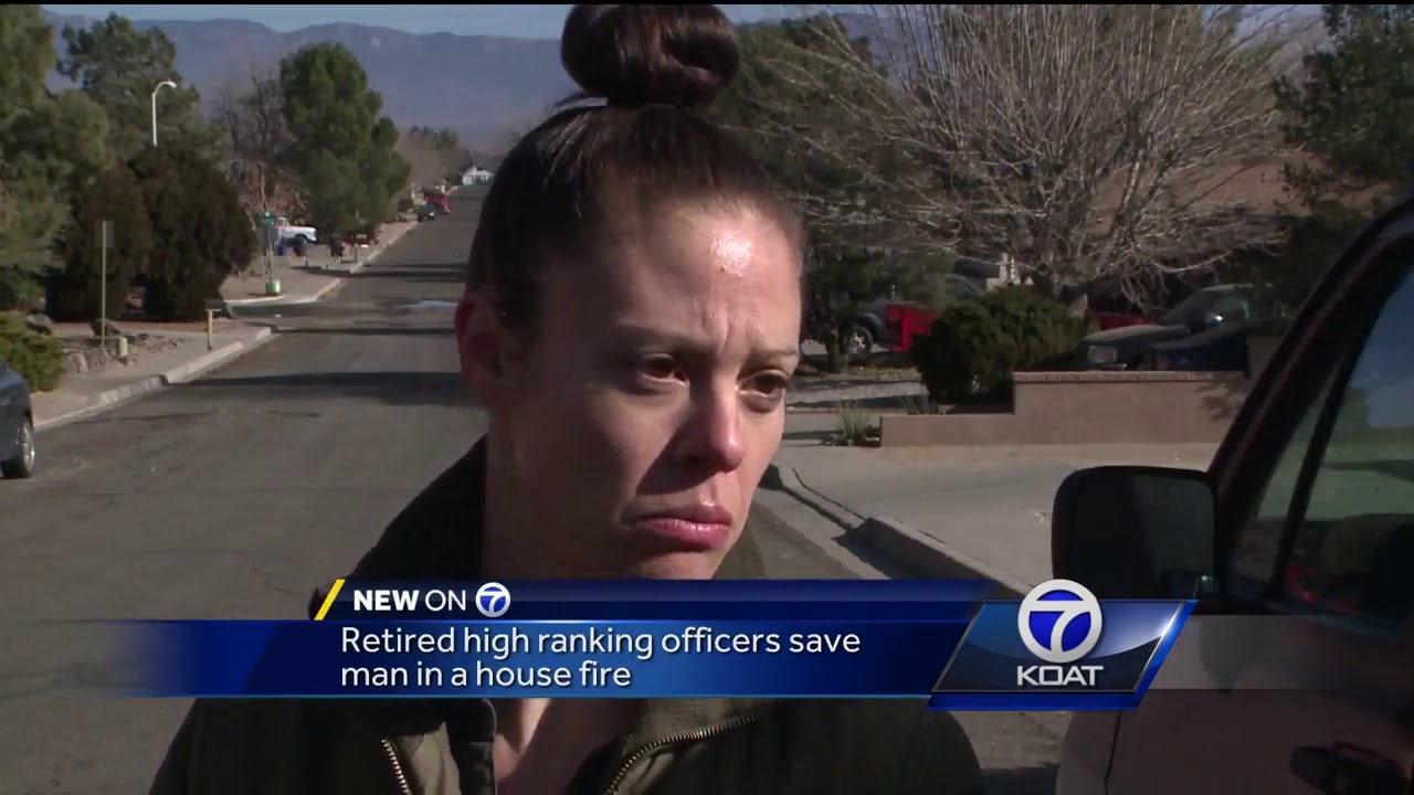 Retired officers rush to save man in burning house - YouTube