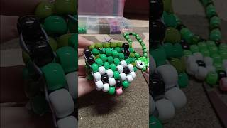attaching my gir kandi charm to a bracelet cuff #bracelet #beads #kandi