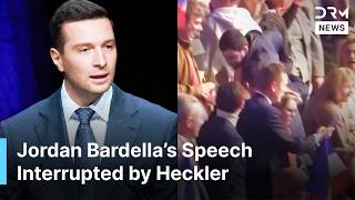 Heckler Disrupts Bardella’s Rally as French Far-Right Leader Calls for National Anthem | AC1N