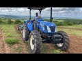 Trator New Holland tt4.75 cortando terra em matas do riachão em cacimba de dentro pb