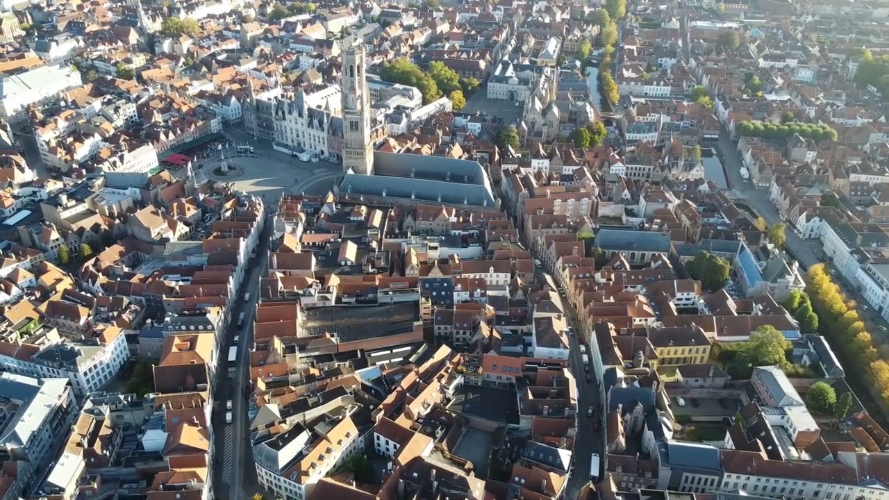 The Saint-Salvator Cathedral and surrounding City.  DRONE - Bruges Belgium - ECTV