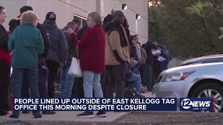 People lined up outside E Kellogg tag office despite closure
