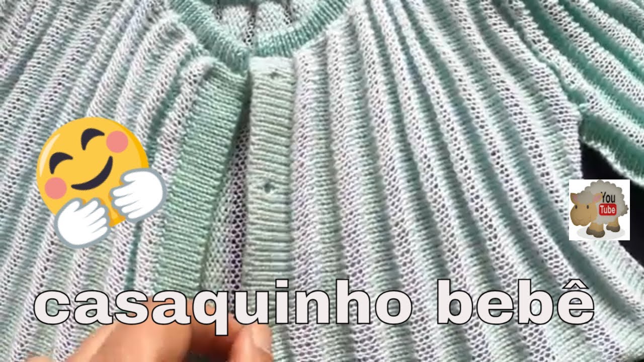 casaquinho de bebê feito aptravessado em máquina de tricô