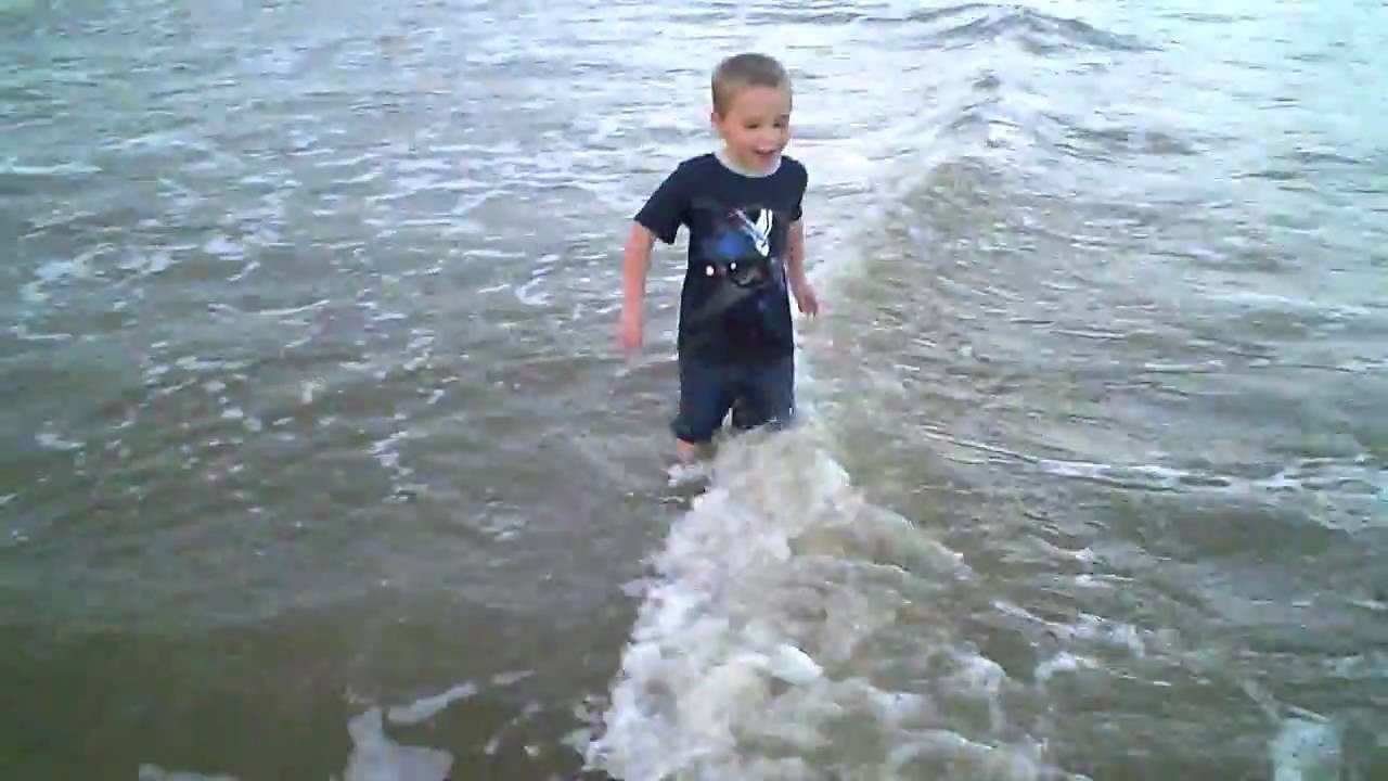 Ethan playing at Galveston (and falling in the water) YouTube