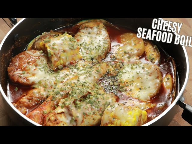 CHEESY SEAFOOD BOIL WITH GREEN LIP MUSSELS AND KING CRAB LEGS