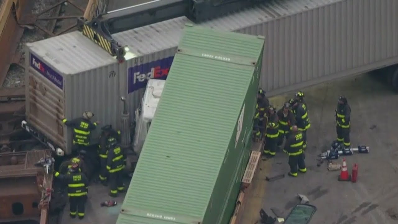 1 person killed after freight train strikes semi in Fuller Park YouTube