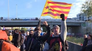 Activists block roads, trains in Catalonia strike