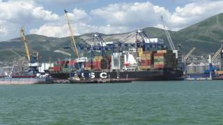 Cargo Ship is Staying in Sea Port in Sunny Day, Waiting For a Goods Loading
