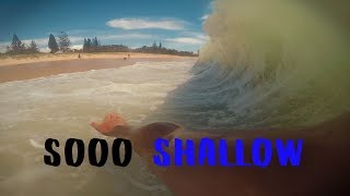 SHOREBREAK ON SAND