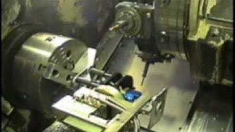 Automated Loading System with Gripper Assembly and Stacked Part Queue