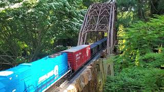 USA Trains SD70macs pulling a short hopper train at the Morris Arboretum garden railway