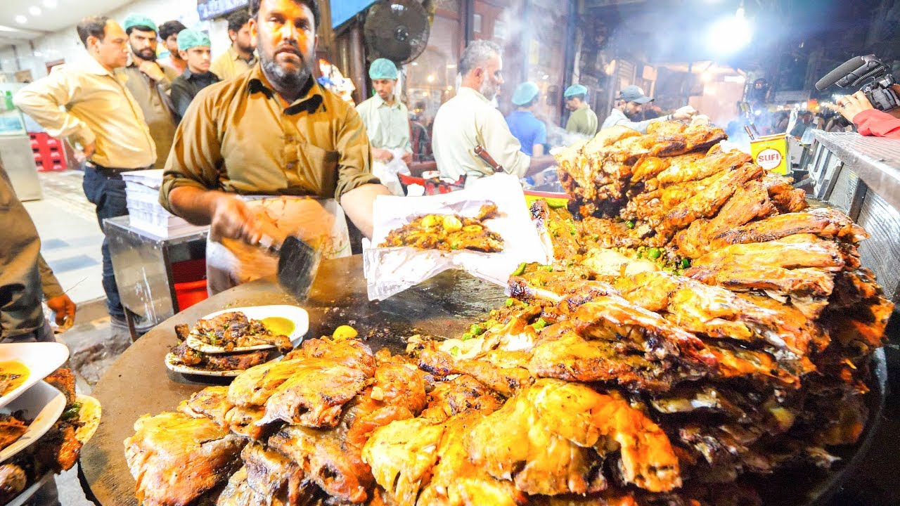 Street Food in Pakistan - HARDCORE Chicken, GOAT Foot PAYA + Pakistani Street Food TOUR of Lahore!!!
