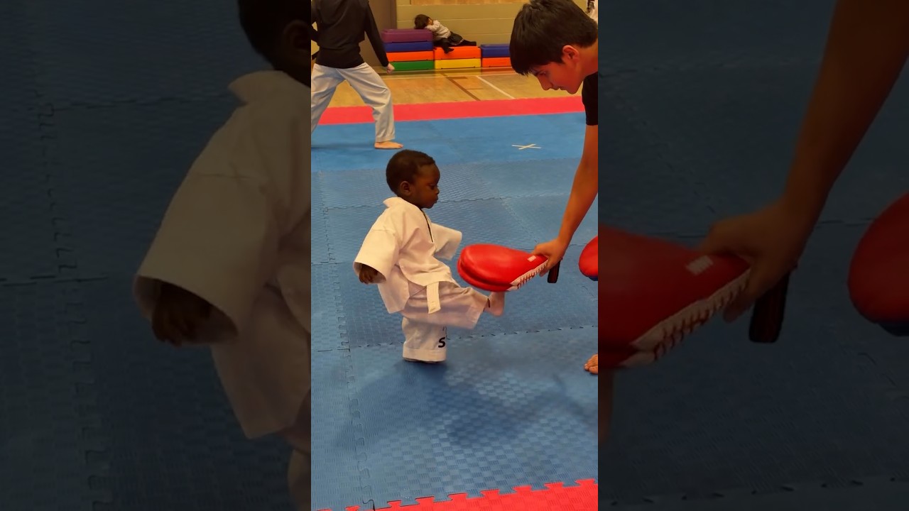 Adorable 1-year-old practices taekwondo with tiny kicks