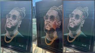 Burna Boy Receives A Painting Made With 15,000 Crystals Of D And Black Diamond