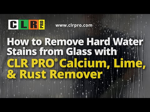 Frigidaire front-load washer glass cleaning hard water stains with CLR