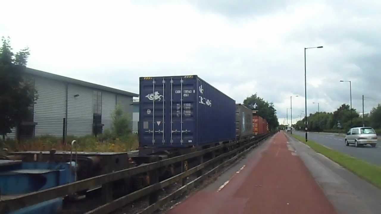 Class 09 002 passes Trafford Park, Barton Dock road with Freight 19/7/12