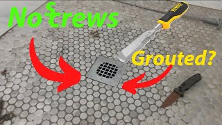 How to remove drain cover that might be grouted??? Watch before you break your tile!!!!