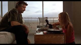 Jackie Brown - "He moves his lips when he reads"