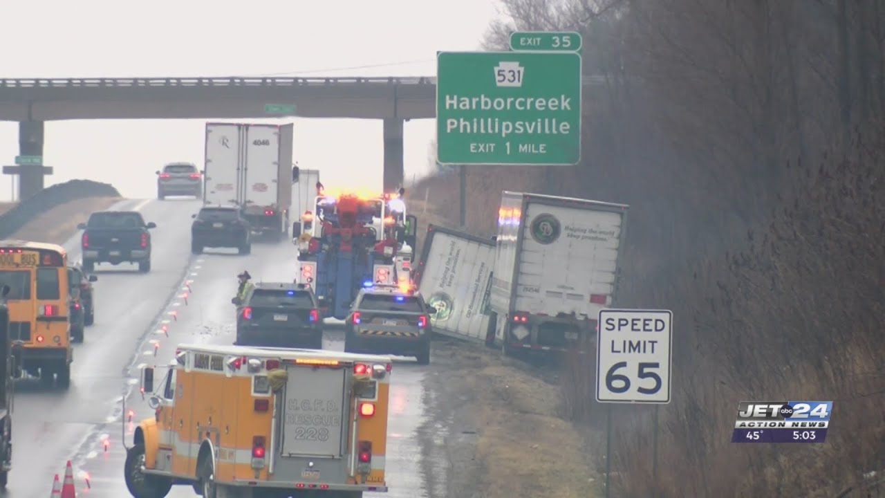 Tractor-trailer rollover slows down Interstate 90 traffic - YouTube