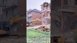 Controlled Building Demolition Using Hydraulic Excavators