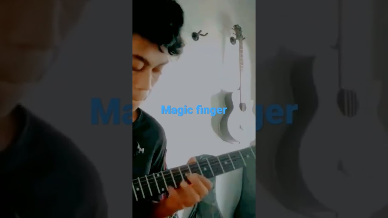 MAGIC FINGER GUITAR PLAYER