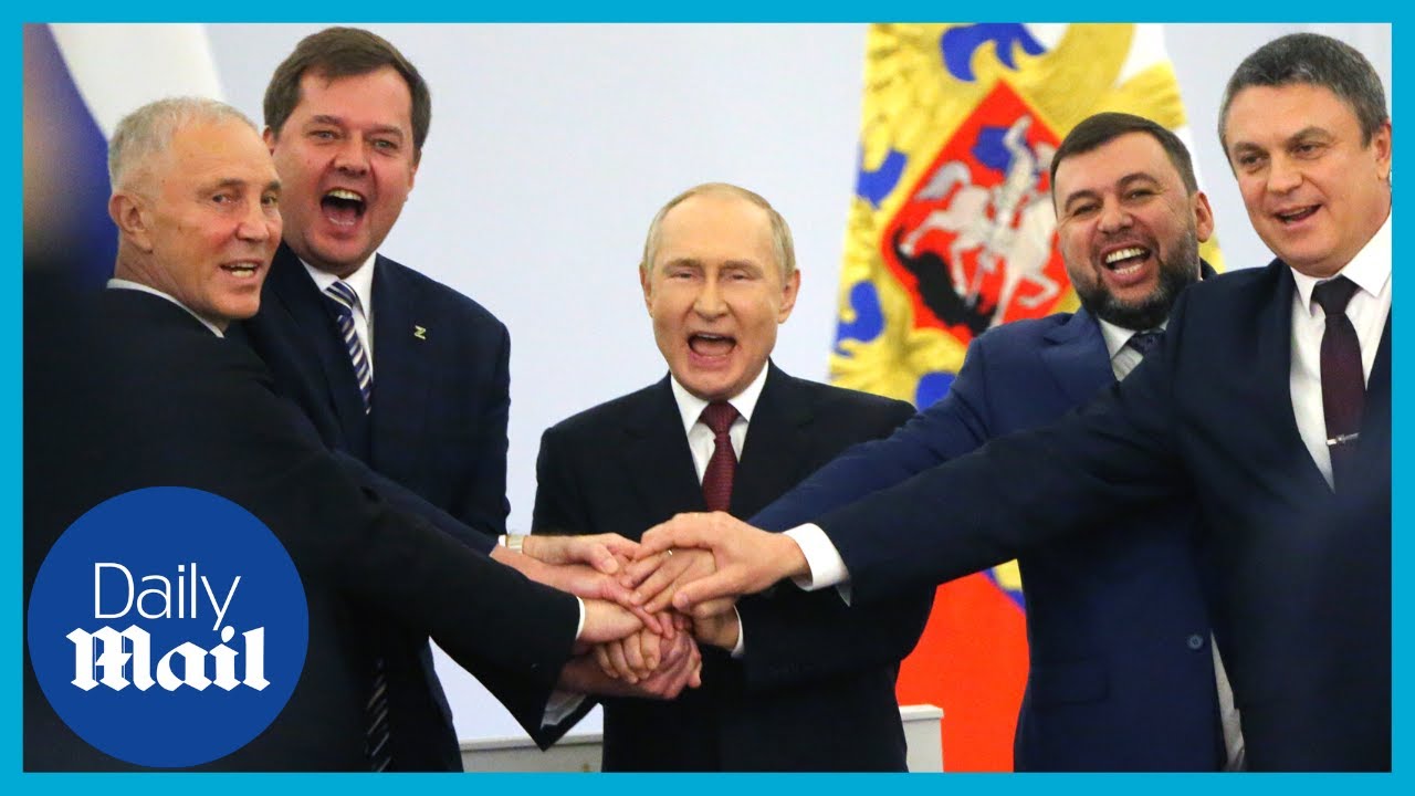 Putin holds hands with Russia-backed leaders chanting ‘Russia, Russia, Russia!’