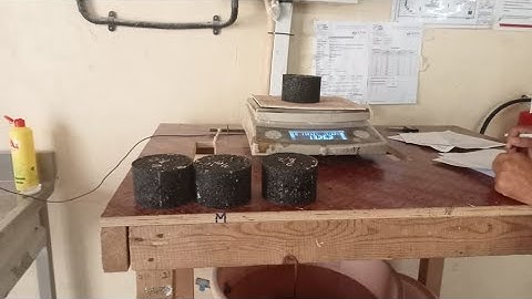 Determination of Sp. Gravity of Marshall Specimens by AASHTO T166 Method