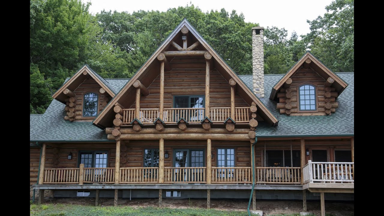 1.3M log home on Lake Michigan built with wood theme in mind YouTube