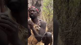 Hadzabe Tribe enjoy eating bush food