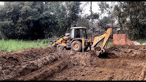 JCB Backhoe Loader Digging A Pond Fish Farm - JCB Loading Soil On Tractor Video