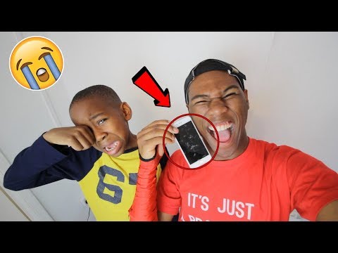 I smashed my little brothers iPhone 7.. **PRANK!** (Backfires)