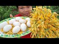 Cooking egg duck with sesbania flower -  eating  delicious