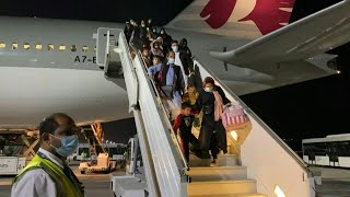 Latest Qatar flight evacuating Afghans arrives in Doha | AFP