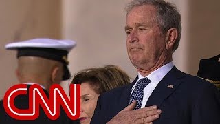 The emotional moment as Bush watches father's casket enter Capitol